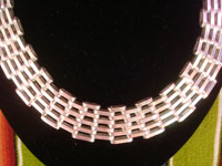 Mexican vintage sterling silver jewelry, and Taxco vintage silver jewelry, a beautiful Taxco sterling silver necklace with matching earrings, Taxco, c. 1980's. Closeup photo of one part of the Taxco necklace.