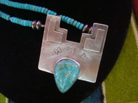 Native American Indian vintage sterling silver jewelry, and Hopi vintage sterling silver jewelry, a beautiful Hopi necklace with a sterling silver pendant depicting a Hopi tableta with butterflies and wonderful turquoise, Arizona, c. 1950's.  A closeup photo of the tableta pendant.