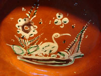 Mexican vintage pottery and ceramics, a beautiful banderaware pottery charger with wonderful artwork, Tonala or San Pedro Tlaquepaque, Jalisco, c. 1930's. Closeup photo of the artwork.
