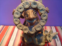 Mexican vintage folk art, a folk art pottery sculpture, Ocumicho, Michoacan, c. 1940's.  A closeup photo of the piece.
