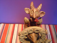 Mexican vintage folk art, a folk art pottery sculpture, Ocumicho, Michoacan, c. 1940's.  Another closeup photo.