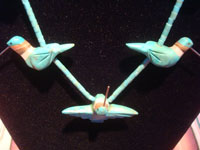 Native American Indian vintage sterling silver jewelry, and Navajo sterling silver jewelry, a stunning necklace with hummingbirds, graceful and lovely lapidary work, c. 1960. Closeup photo of the front of the necklace.