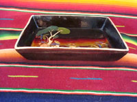 Mexican vintage pottery and ceramics, a rectangular dish, blackware, with a wonderful scene of a snoozing Mexican peasant under a tree, Tlaquepaque, c. 1930-40's. A photo showing a side view of the dish.