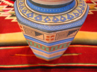 Mexican vintage pottery and ceramics, a vase with geometric prehispanic designs by the famous artist, Ladislao Ortega, Tonala, Jalisco, c. 1930's. Closeup photo of one side of vase.