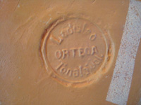 Mexican vintage pottery and ceramics, a vase with geometric prehispanic designs by the famous artist, Ladislao Ortega, Tonala, Jalisco, c. 1930's. Photo of the artist's stamp on the bottom of the vase.