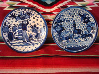 Mexican vintage pottery and ceramics, two very beautiful plates with a white background and wonderful blue artwork decoration, Tlaquepaque, c. 1930-40's. Main photo showing the two plates.