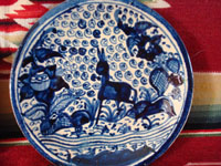 Mexican vintage pottery and ceramics, two very beautiful plates with a white background and wonderful blue artwork decoration, Tlaquepaque, c. 1930-40's. Photo of the second plate, showing the wonderful burro and floral design of the plate.