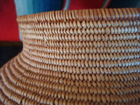 Native American Indian antique baskets, a beautiful polychrome Chemehuevi olla, c. 1920.  A closeup photo of the Chemehuevi Indian basket, showing the tightness of the weave.