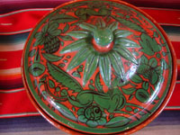 Mexican vintage pottery and ceramics, a fantasia-ware lidded casserole with beautiful and fanciful hand-painted decorations, Tonala or Tlaquepaque, Jalisco, c. 1940's. Photo shot from above and looking down at the lid of the fantasia bowl.