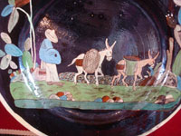 Mexican vintage pottery and ceramics, a beautiful blackware charger with a wonderful rural scene, San Pedro Tlaquepaque or Tonala, Jalisco, c. 1930-40's. Closeup photo of the front of the charger.