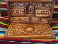 Mexican vintage folk art, and Mexican vintage woodcarvings and masks, a fabulous wooden escritorio (portable writing desk) with very fine marquetry inlay work, Oaxaca, c. 19th century. Photo with the front cover opened and showing the marquetry of the inside of the desk.