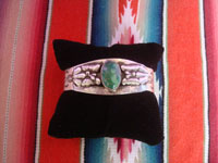 Native American Indian sterling silver jewelry, and Navajo vintage sterling silver jewelry, a beautiful Navajo silver bracelet with a lovely turquoise stone and with beautiful butterflies on either side, Arizona or New Mexico, c. 1950.Main photo of the bracelet.