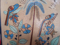 Mexican vintage folk art, and Mexican vintage pottery and ceramics, a lovely pottery tile decorated with a lovely bird and tropical foliage, San Pedro Tlaquepaque, c. 1940's. Closeup photo of the tile showing a lovely bird and palm tree.