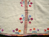 Mexican vintage sarapes and textiles, a lovely textile from the state of Chiapas finely woven and beautifully decorated, Chiapas c. 1980's. Closeup photo of a part of the textile.