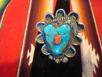 Native American Indian vintage sterling silver jewelry, and Navajo vintage sterling silver jewelry, a beautiful Navajo nugget ring of sterling silver with turquoise and corral, Arizona or New Mexico, c. 1940's. Closeup photo of the front of the ring.
