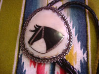 Native American Indian sterling silver jewelry, and Navajo sterling silver jewelry, a wonderful bolo tie featuring a beautiful horse, Arizona or New Mexico, c. 1940's. Closeup photo of the horse bolo.