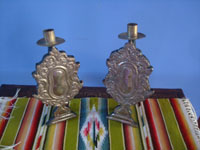 Mexican tinwork art candle shields properly known as "palmerines" because they resemble trees. Mexico City, c. 1940. Main photo of the tinwork pieces.