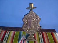 Mexican tinwork art candle shields properly known as "palmerines" because they resemble trees. Mexico City, c. 1940. Photo of one of the pieces.