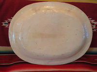 Mexican vintage pottery and ceramics, a beautiful fantasia-ware (fantasia) platter with highly imaginative decoration, Tlaquepaque, Jalisco, c. 1920-30's. Photo showing the back side of the fantasia platter.