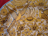 Mexican vintage pottery and ceramics, a beautiful fantasia-ware (fantasia) platter with highly imaginative decoration, Tlaquepaque, Jalisco, c. 1920-30's. Closeup photo of one of the birds decorating the front of the fantasia-ware platter.