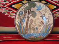 Mexican vintage pottery and ceramics, a petatillo (cross-hatching in the background resembling a straw mat or petate) plate with very fine artwork, attributed to the famous artist Balbino Lucano, Tlaquepaque, Jalisco, c. 1930. Main photo of the pottery plate attributed to Balbino Lucano, Tlaquepaque, c. 1930's.