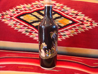 Mexican vintage pottery and ceramics, a beautiful black-ware bottle with exquisite artwork, Tlaquepaque, Jalisco, c. 1930's. Main photo of the Tlaquepaque vintage pottery bottle.