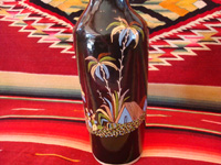 Mexican vintage pottery and ceramics, a beautiful black-ware bottle with exquisite artwork, Tlaquepaque, Jalisco, c. 1930's. A photo showing lovely palm trees decorating the Tlaquepaque pottery black-ware bottle.