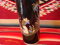 Mexican vintage pottery and ceramics, a beautiful black-ware bottle with exquisite artwork, Tlaquepaque, Jalisco, c. 1930's. Closeup photo of the Mexican campesino on the Tlaquepaque black-ware bottle.