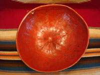 Mexican vintage folk art, a laquer-ware gourd with wonderful decorations, Uruapan, c. 1940's. Photo showing the inside of the gourd, painted red.