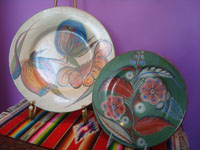 Mexican vintage pottery and ceramics, two burnished pottery plates with incredibly artwork, Tonala Jalisco, c. 1930's. Main photo of the two plates.