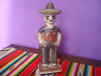 Mexican vintage folk art, a wonderful pottery figure of a cowboy, Guerrero, c. 1950's. Main photo of the front of the cowboy.