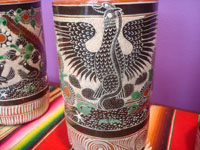 Mexican vintage pottery and ceramics, a set of three pottery petatillo (background of fine cross-hatching resembling a straw mat or petate, in Spanish) chocolate cups, with fabulous artwork, signed by the great Jose Bernabe, Tonala or San Pedro Tlaquepaque, c. 1930's. Closeup photo of one cup showing the eagle with outstretched wings.