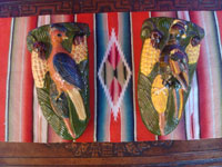 Mexican vintage pottery and ceramics, a beautiful pair of pottery wall-sconces with wonderful glazing and featuring a bird on each sconce eyeing delicious corn, San Pedro Tlaquepaque, c. 1940's. Main photo of the sconces.