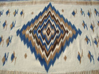 Mexican vintage textiles and sarapes, a beautiful Mayo textile with indigo blue and natural wool colors, Mexico, c.. 1940's. Closeup photo of the central diamond.