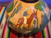 Mexican vintage pottery and ceramics, a lovely pottery water jar with a drinking cup on the top, Tonala or San Pedro Tlaquepaque, c. 1940. Closeup photo of the horseback rider.