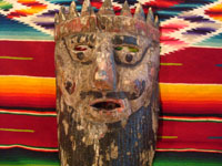 Mexican vintage wood-carving and Mexican vintage folk art, a mask of a European king used in dance celebrations in Apaxtla, Puebla, c. 1920. Closeup photo of the mask.