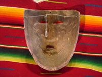 Mexican vintage wood carving and Mexican vintage folk art, a dance mask depicting a European woman, from Guerrero, c. 1930-40. Photo showing the back side of the mask.