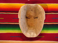 Guatemalan vintage wood-carving and folk art, a carved wooden mask used in dances, Guatemala, c. 1940's. Photo of the back side of the mask.