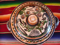 Mexican vintage pottery and folk art, a lovely petatillo casserole with lid, Tonala, Jalisco, c. 1950-60, by famed artist Jose Bernabe. The casserole features wonderful and very intricate floral and zoomorphic figures. Photo from above the casserole.