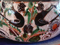 Mexican vintage pottery and folk art, a lovely petatillo casserole with lid, Tonala, Jalisco, c. 1950-60, by famed artist Jose Bernabe. The casserole features wonderful and very intricate floral and zoomorphic figures. Another closeup photo of animals decorating the casserole.
