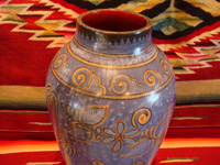 Mexican vintage pottery and ceramics, a beautiful Tonala burnished vase or large jar with a blue background and a "starry-night" background-design, Tonala, Jalisco, c. 1930. A photo of the top part of the Tonala pottery vase.
