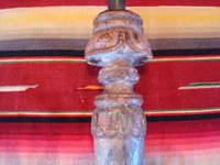 Mexican antique wood-carving, a pair of wooden candleholders, c. early to mid-19th century, and possibly from the colonial period.  A closeup photo of the wood-carved top on one candleholder.