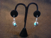 Native American Indian and Navajo sterling silver jewelry, a wonderful pair of Navajo silver earrings with turquoise, c. 1950. Main photo.