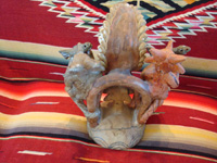 Mexican vintage pottery and ceramics, and Mexican vintage folk-art, a wonderful pottery piece from Ocumicho, Michoacan, c. 1940-50's, depicting the crescent moon with devils. A photo of the back side of the Ocumicho pottery piece.