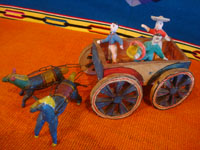 Mexican vintage folk art, and Mexican vintage pottery and ceramics, a wonderful pottery cart or carriage, pulled by two horses and filled with happy campesinos, attributed to the great folk artist, Candelario Medrano, Santa Cruz de las Huertas, Jalisco, c. 1940's.  Main photo of the cart and horses.