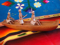 Native American Indian vintage folk art, a wonderful carved wooden canoe with Indians busilly paddling in search of some tasty salmon, Klamath or Karok, c. 1920. Main photo of the canoe.