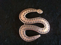 Native American Indian sterling silver jewelry, and Navajo vintage sterling silver jewelry, a wonderful sterling silver broach or pin depicting a graceful and very dramatic snake, Arizona or New Mexico, c. 1960's. Main photo of the Navajo silver broach.