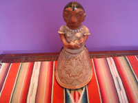 Mexican vintage folk art, a pottery figure of a Purepecha woman and child, Michoacan (very possibly from the city of Capula), c. 1970's. Main photo of the piece.