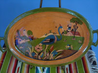 Mexican vintage pottery and ceramics, a beautiful pottery oval platter with very fine artwork and a lovely tangerine-colored background, San Pedro Tlaquepaque, c. 1930's. Main photo of the platter.