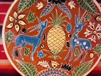 Closeup photo of the vintage Mexican pottery plate.